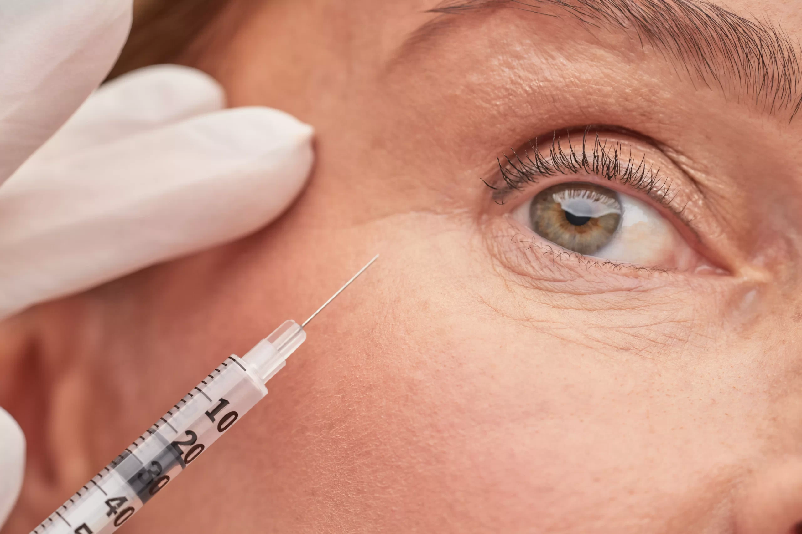 AnyConv.com__beautician-hands-in-protective-gloves-holding-syri-2022-09-09-04-47-42-utc