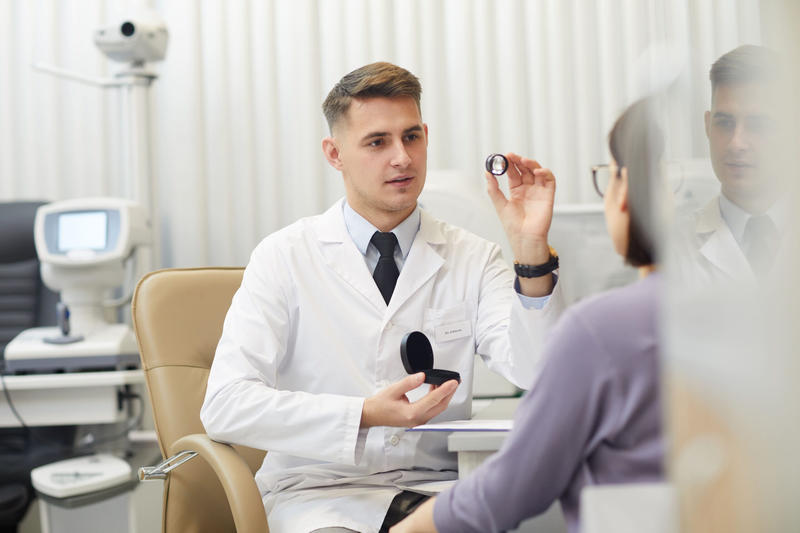 ophthalmologist-examining-patient-2021-09-24-04-16-18-utc-min